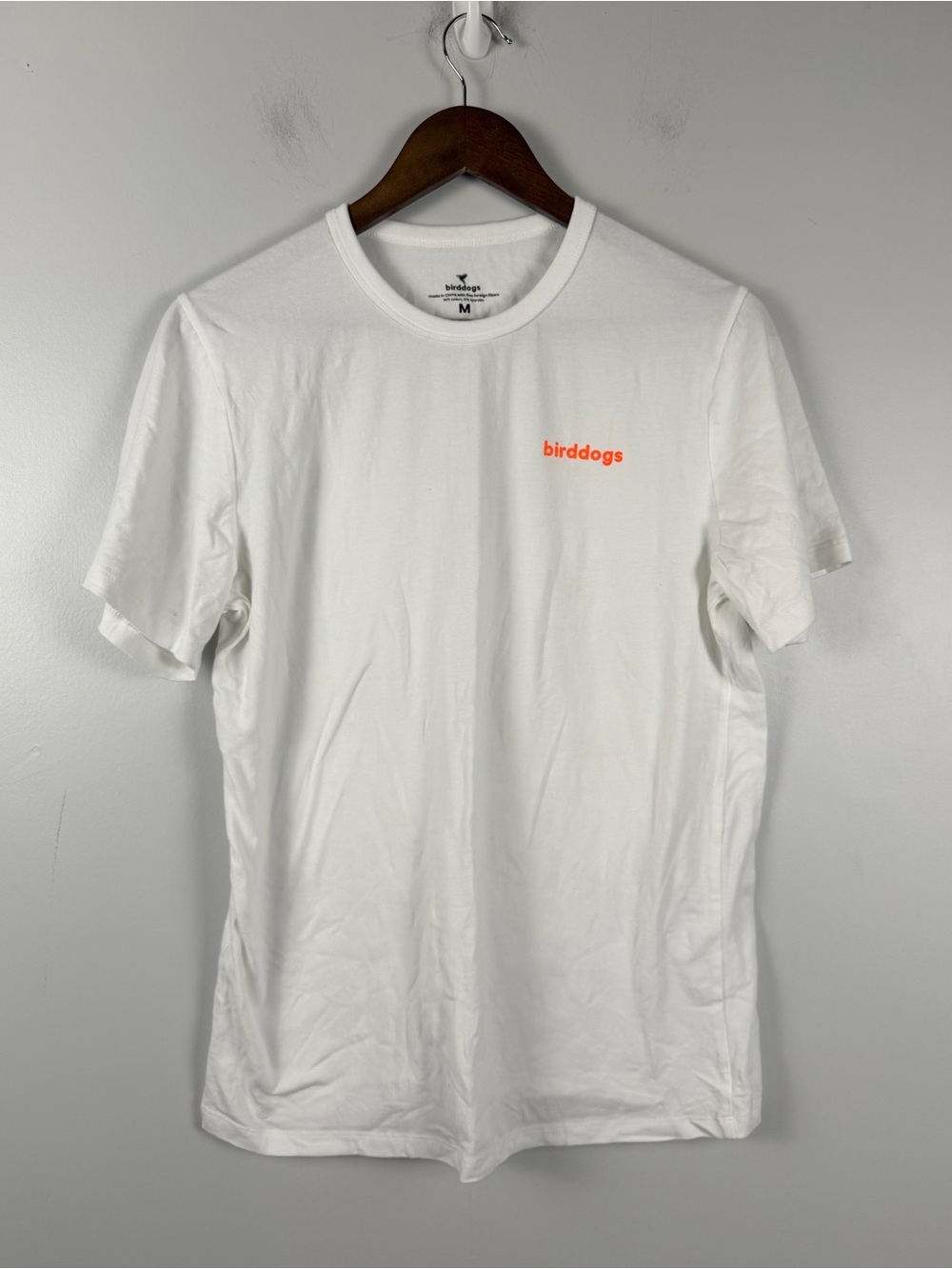Birddogs white tee shirt with orange and blue detail size medium
